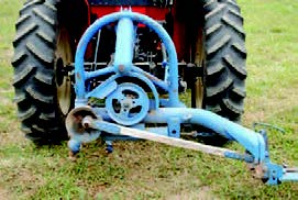 The image of the wooden piece in the power transmission unit of the Knife Cutter mower (hand lever)