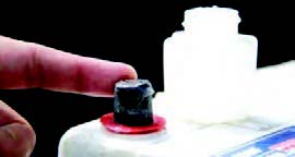 Applying grease to the poles